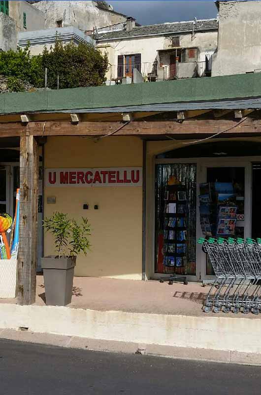 Shops (delicatessen, gas station, ticket machine) in Cap Corse (Corsica)